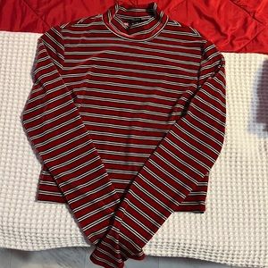 A long sleeve strip turtleneck
